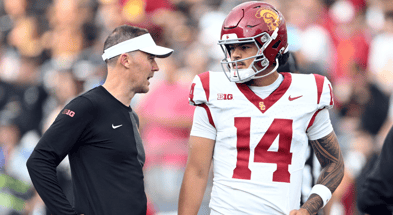 USC Trojans quarterback Jayden Maiava (14) talks with Southern California Trojans head coach Lincoln Riley before the game against the Purdue Boilermakers at Ross-Ade Stadium