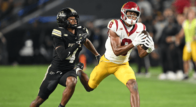 USC Trojans wide receiver Ja'Kobi Lane (8) catches a pass in front of Purdue Boilermakers defensive back Hudauri Hines (4) during the second half at Ross-Ade Stadium