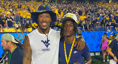 Mobile, Alabama, 2027 wide receiver Carter Davis with Bruce Irvin at West Virginia’s game against Pitt