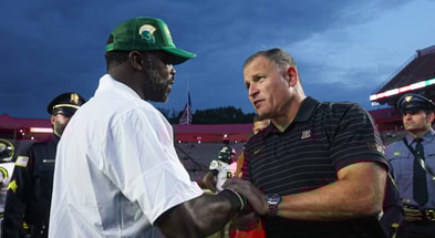 Rutgers Football HC Greg Schiano and Norfolk State HC Michael Vick