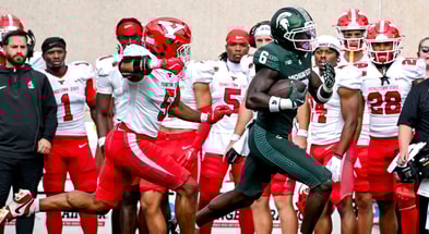 Michigan State's Nick Marsh, right, runs after a catch as Youngstown State's Carston Marshall follows behind during the second quarter on Saturday, Sept. 13, 2025, at Spartan Stadium in East Lansing. - Nick King, USA TODAY Sports