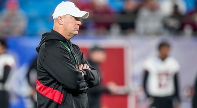 Dec 2, 2023; Charlotte, NC, USA; Louisville Cardinals head coach Jeff Brohm during warm ups against the Florida State Seminoles at Bank of America Stadium. Mandatory Credit: Jim Dedmon-Imagn Images