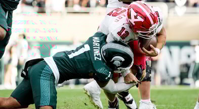 Michigan State defensive back Nikai Martinez (1) tackles Youngstown State quarterback Beau Brungard (12) in the third quarter at Spartan Stadium. - Brendan Mullin, USA TODAY Sports