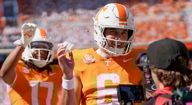 Angelina Alcantar/News Sentinel / USA TODAY NETWORK via Imagn Images | Tennessee quarterback Joey Aguilar (6) celebrates after running in a touchdown during the NCAA college football game against Georgia on September 13, 2025, Knoxville, Tennessee.