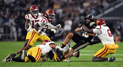 Purdue Boilermakers running back Devin Mockobee (45) is tackled by multiple USC Trojans during the second quarter at Ross-Ade Stadium