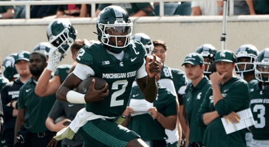 Michigan State quarterback Aidan Chiles (2) runs for a first down against Youngstown State in the first quarter at Spartan Stadium. - Brendan Mullin, USA TODAY Sports