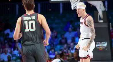 Nov 29, 2024; Paradise Island, Bahamas, BHS; Louisville Cardinals forward Kasean Pryor (7) reacts after scoring past Oklahoma Sooners forward Sam Godwin (10) during the first half at Imperial Arena at the Atlantis resort. Mandatory Credit: Kevin Jairaj-Imagn Images
