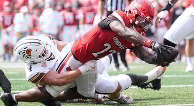 Louisville Cardinals running back Keyjuan Brown (22) lunges towards the endzone for a Cardinals touchdown in the first quarter against Bowling Green at L&N Federal Credit Union Stadium in Louisville, Kentucky Sept. 20, 2025.