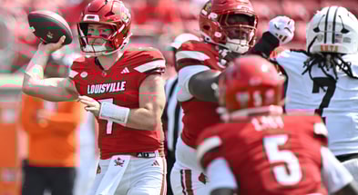 Sep 20, 2025; Louisville, Kentucky, USA; Louisville Cardinals quarterback Miller Moss (7) looks to pass against the Bowling Green Falcons during the second half at L&N Federal Credit Union Stadium. Louisville defeated Bowling Green 40-17. Mandatory Credit: Jamie Rhodes-Imagn Images
