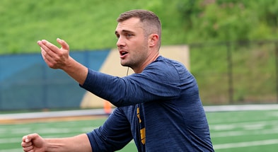 West Virginia wide receivers coach Ryan Garrett
