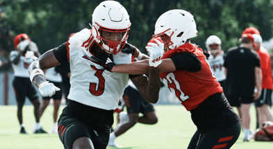 U of L WR Dacari Collins (3) fights to get open on a route on the practice field at Cardinal Stadium in Louisville, Ky. on July 30, 2025.