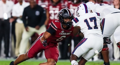 Sep 6, 2025; Columbia, South Carolina, USA; South Carolina Gamecocks linebacker Dylan Stewart (6) brings down South Carolina State Bulldogs running back KZ Adams (17) in the first quarter at Williams-Brice Stadium. Mandatory Credit: Jeff Blake-Imagn Images