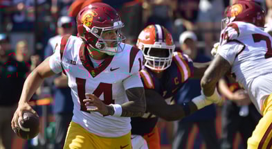 USC Trojans quarterback Jayden Maiava (14) scrambles with the ball during the second half against the Illinois Fighting Illini at Memorial Stadium
