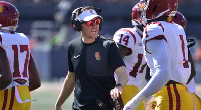 USC Trojans head coach Lincoln Riley talks with players during the first half against the Illinois Fighting Illini at Memorial Stadium