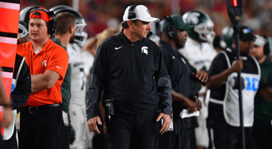 Michigan State Spartans head coach Jonathan Smith watches game action against the Southern California Trojans during the second half at the Los Angeles Memorial Coliseum. - Gary A. Vasquez, USA TODAY Sports