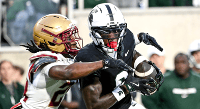 Michigan State's Nick Marsh, right, catches a touchdown pass as Boston College's Amari Jackson attempts to make the tackle during the first quarter on Saturday, Sept. 6, 2025, at Spartan Stadium. - Nick King, USA TODAY Sports
