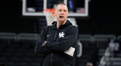 Mar 20, 2025; Milwaukee, WI, USA; Kentucky Wildcats head coach Mark Pope looks on during NCAA Tournament First Round Practice at Fiserv Forum. Mandatory Credit: Jeff Hanisch-Imagn Images