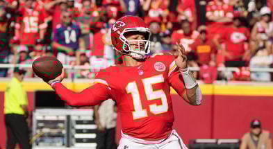 Sep 28, 2025; Kansas City, Missouri, USA; Kansas City Chiefs quarterback Patrick Mahomes (15) throws a pass during the first quarter against the Baltimore Ravens at GEHA Field at Arrowhead Stadium. Mandatory Credit: Denny Medley-Imagn Images