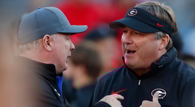 Georgia head coach Kirby Smart with Kentucky's Mark Stoops, via Joshua L. Jones : USA TODAY NETWORK
