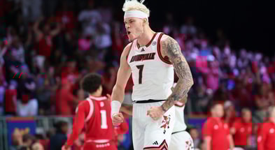 Nov 27, 2024; Paradise Island, Bahamas, BHS; Louisville Cardinals forward Kasean Pryor (7) reacts after dunking during the second half against the Indiana Hoosiers at the Atlantis Resort. Mandatory Credit: Kevin Jairaj-Imagn Images