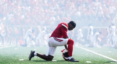 Louisville Cardinals wide receiver Chris Bell (0) takes a moment before the game against visiting Bowling Green in Louisville, Kentucky. Sept. 20, 2025