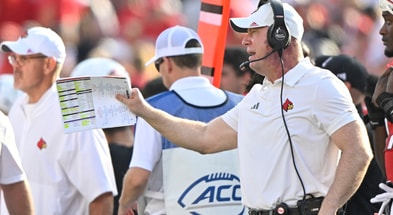 Oct 4, 2025; Louisville, Kentucky, USA; Louisville Cardinals head coach Jeff Brohm calls out instructions during the second quarter against the Virginia Cavaliers at L&N Federal Credit Union Stadium. Virginia defeated Louisville 30-27. Mandatory Credit: Jamie Rhodes-Imagn Images