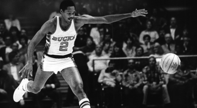 Junior Bridgeman runs down the ball during a gam in January, 1987.