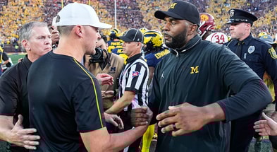 USC HC Lincoln Riley and Michigan HC Sherrone Moore