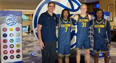 Cal head coach Mark Madsen and players at ACC Tipoff