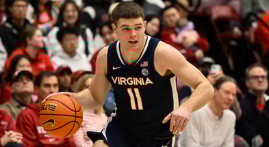 Jan 11, 2025; Stanford, California, USA; Virginia Cavaliers guard Isaac McKneely (11) dribbles against the Stanford Cardinal in the first half at Maples Pavilion. Mandatory Credit: Eakin Howard-Imagn Images