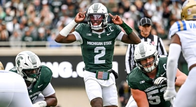 Michigan State's Aidan Chiles prepares for the snap against UCLA during the first quarter on Saturday, Oct. 11, 2025, at Spartan Stadium in East Lansing. - Nick King, USA TODAY Sports