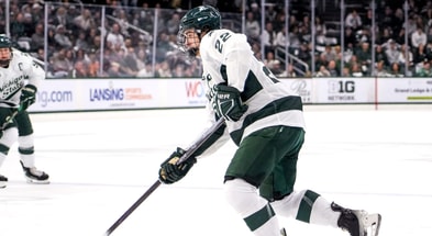 Michigan State's Patrick Geary moves the puck against New Hampshire during the first period on Thursday, Oct. 9, 2025, at Munn Ice Arena in East Lansing. - Nick King, USA TODAY Sports