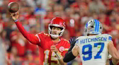 Oct 12, 2025; Kansas City, Missouri, USA; Kansas City Chiefs quarterback Patrick Mahomes (15) makes a throw against the Detroit Lions during the second half at GEHA Field at Arrowhead Stadium.