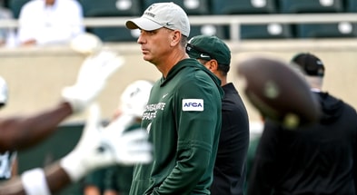 Michigan State's offensive coordinator Brian Lindgren watches during warmups before the football game against Western Michigan on Friday, Aug. 29, 2025, in East Lansing. - Nick King, USA TODAY Sports