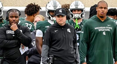 Michigan State's head coach Jonathan Smith, center, looks on from the sideline during the third quarter in the game against UCLA on Saturday, Oct. 11, 2025, at Spartan Stadium in East Lansing. - USA TODAY Sports
