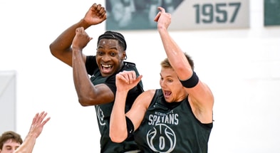 Michigan State's Cam Ward, left, and Jaxon Kohler celebrate during the first day of basketball practice on Monday, Sept. 22, 2025, at the Breslin Center in East Lansing. - Nick King, USA TODAY Sports