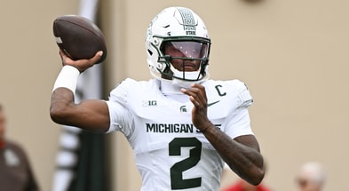 Michigan State Spartans quarterback Aidan Chiles (2) warms up prior to the game against the Indiana Hoosiers at Memorial Stadium. - Robert Goddin, USA TODAY Sports