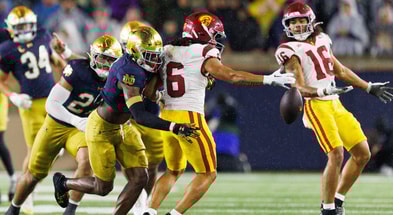 Notre Dame safety Adon Shuler, left, knocks the ball out of the hand of Southern California wide receiver Makai Lemon (6) in the second half of a NCAA football game at Notre Dame Stadium on Saturday, Oct. 18, 2025, in South Bend