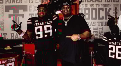 Ayden Johnson with Texas Tech DL coach Zarnell Fitch