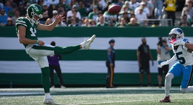 New York Jets punter Austin McNamara (14) kicks the ball during a game against the Carolina Panthers at MetLife Stadium, Oct 19, 2025, East Rutherford, NJ, USA