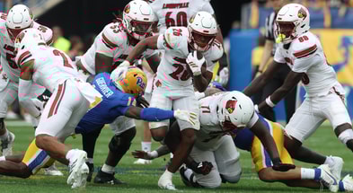 Sep 27, 2025; Pittsburgh, Pennsylvania, USA; Louisville Cardinals running back Duke Watson (26) runs the ball against the Pittsburgh Panthers during the second quarter at Acrisure Stadium. Mandatory Credit: Charles LeClaire-Imagn Images