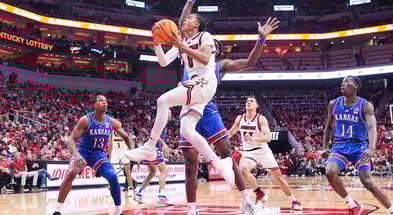 Louisville Cardinals guard Mikel Brown Jr. (0) goes for two of his 10 points in the Cards 90-82 loss against visiting Kansas in the exhibition game at the KFC Yum! Center in Louisville, Kentucky Friday, October 24, 2025.