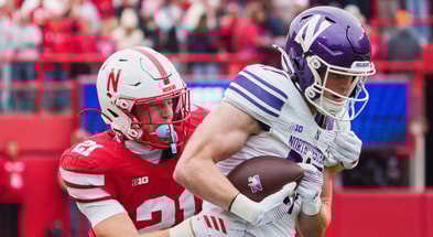 Nebraska football defensive back Rex Guthrie (21) tackles Northwestern wide receiver Griffin Wilde (17) tackles during the first quarter at Memorial Stadium.