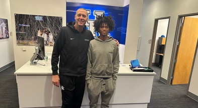 Chase Lumpkin with Kentucky coach Mark Pope (Photo provided by Chase Lumpkin)
