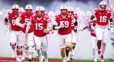 Nebraska football OL Teddy Prochazka (65), OL Rocco Spindler (50), QB Dylan Raiola (15), OL Henry Lutovsky (59) and DL Elijah Jeudy ahead of the Huskers' 28-21 win over Northwestern