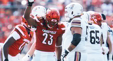 Louisville Cardinals defensive lineman Wesley Bailey (23) had a stop on Bowling Green Falcons wide receiver Allen Middleton (1) in the first half against Bowling Green at L&N Federal Credit Union Stadium in Louisville, Kentucky Sept. 20, 2025.