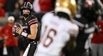 Oct 25, 2025; Louisville, Kentucky, USA; Louisville Cardinals quarterback Miller Moss (7) looks to pass against the Boston College Eagles during the second half at L&N Federal Credit Union Stadium. Louisville defeated Boston College 38-24. Mandatory Credit: Jamie Rhodes-Imagn Images