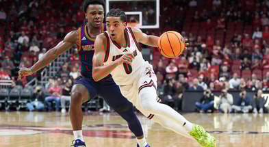 Louisville Cardinals guard Mikel Brown Jr. (0) drives by Bucknell Bison guard Jayden Williams (2) during an exhibition game at the KFC Yum! Center in Louisville, Kentucky Tuesday October 28, 2028.