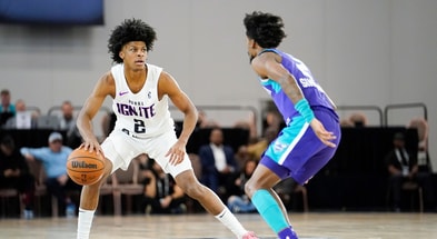 Dec 22, 2022; Las Vegas, NV, USA; NBA G League Ignite guard London Johnson (2) dribbles the ball against Greensboro Swarm guard Kobi Simmons (2) during the first half at Mandalay Bay Convention Center. Mandatory Credit: Lucas Peltier-Imagn Images