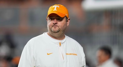 Angelina Alcantar/News Sentinel / USA TODAY NETWORK via Imagn Images | Tennessee coach Josh Heupel during warm-ups before a NCAA football game between the Tennessee Volunteers and Oklahoma Sooners at Neyland Stadium in Knoxville, Tenn., on November 1, 2025.